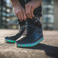 Man doing up his LED high top running shoes