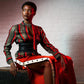 woman wearing black and red silk blouse
